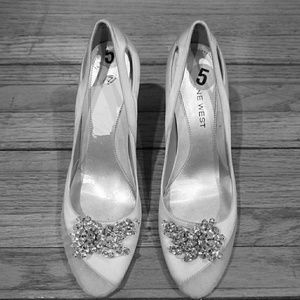Bone colored satin bridal shoes with crystals